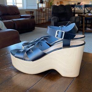 Torrid faux leather notch wood wedge platform 12